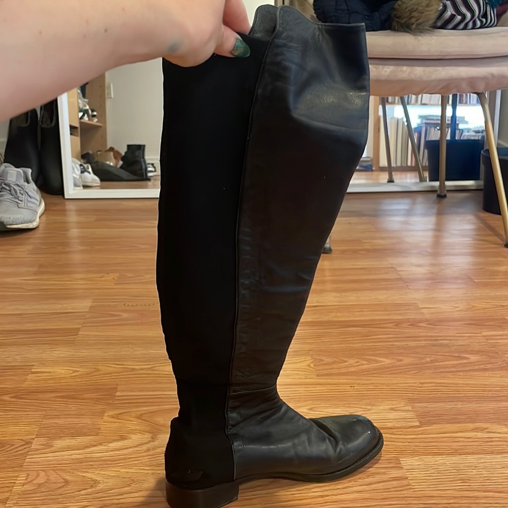 super high stuart weitzman, good condition minor tear on the back of one boot